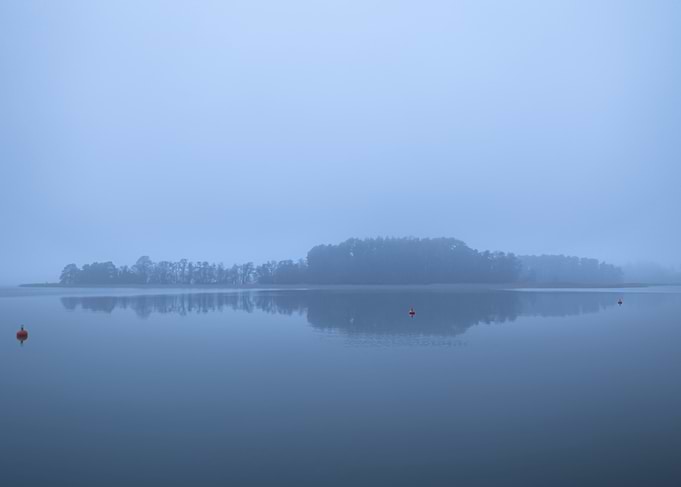 Misty Lake Landscape with Reflections