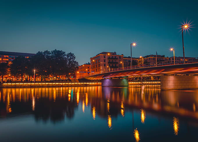 Night Cityscape with Bridge Reflection