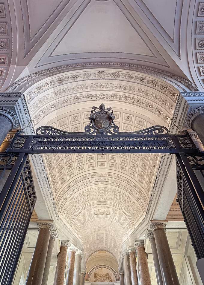 Ornate Hallway with Iron Gate