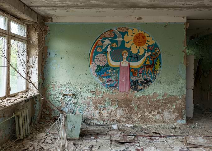 Abandoned room with fresco in Prypiat.