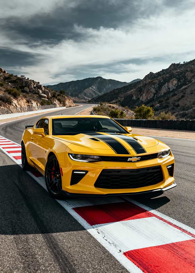 Yellow Chevrolet Camaro on Racetrack