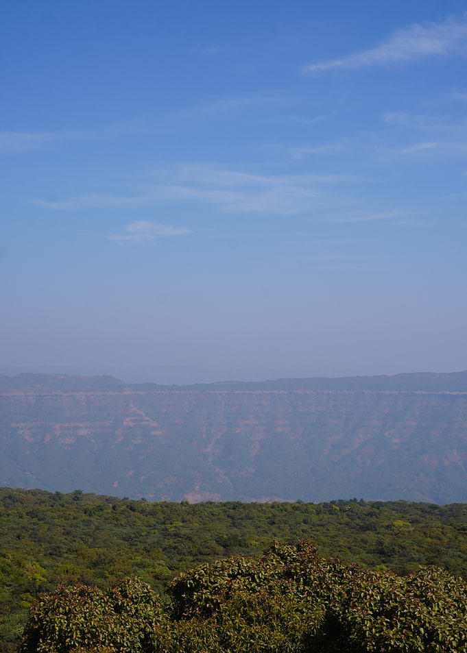Mountain Range Landscape Under Clear Blue Sky