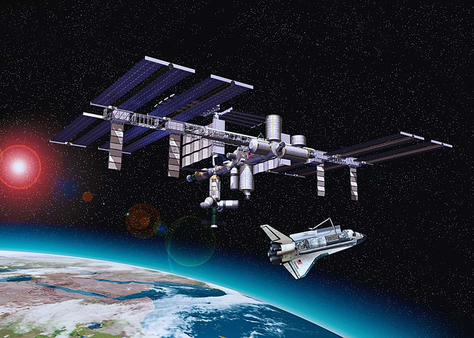 Space Station and Shuttle Orbiting Earth