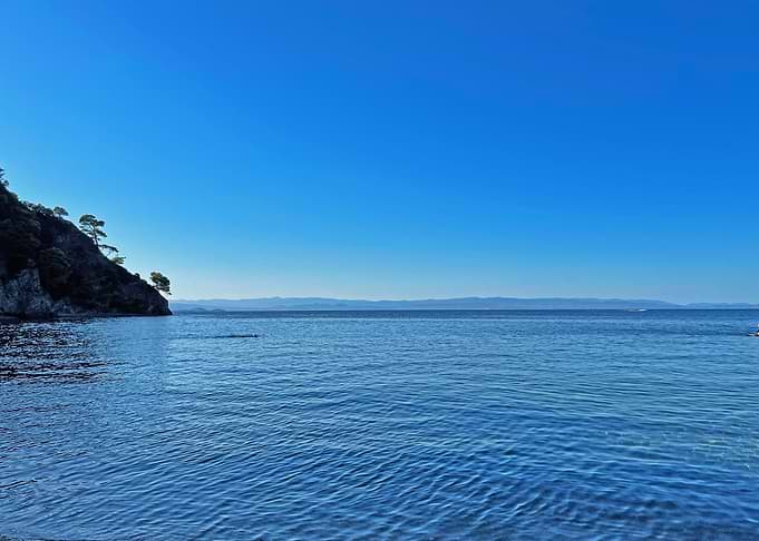 Blue Sea and Rocky Coastline