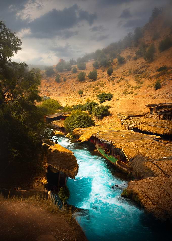 River flowing through a village landscape