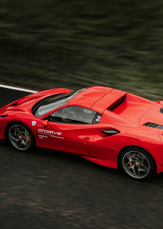 Red Ferrari on the Race Track