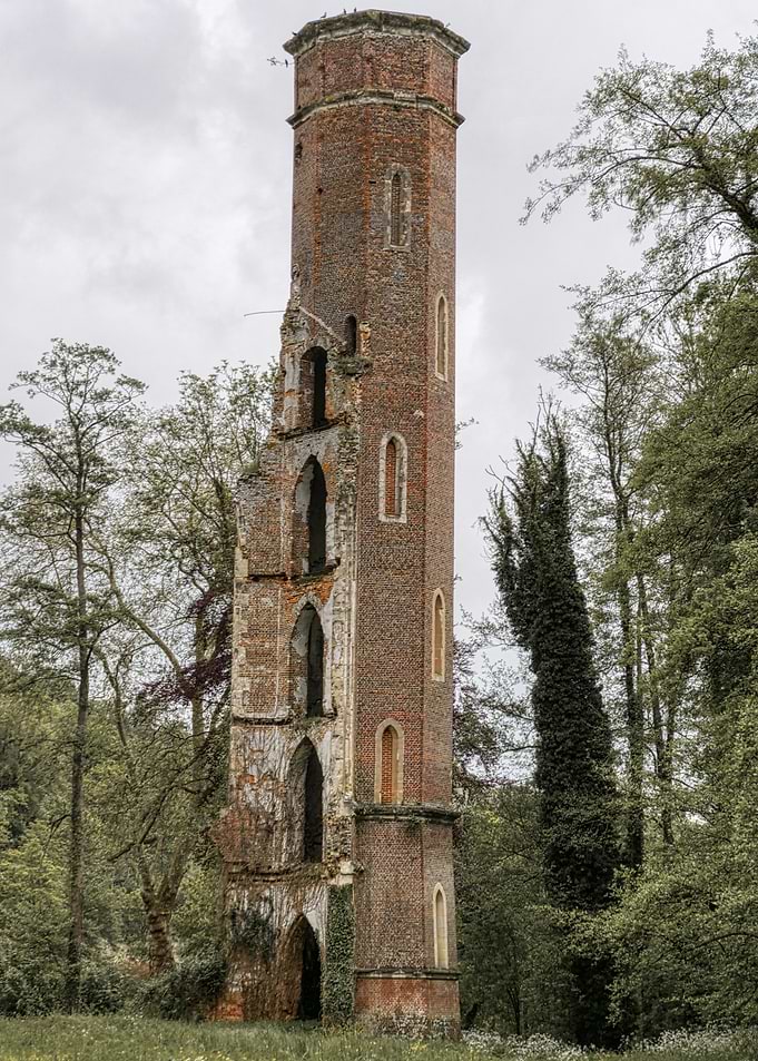 Ruined Brick Tower in Forest Setting