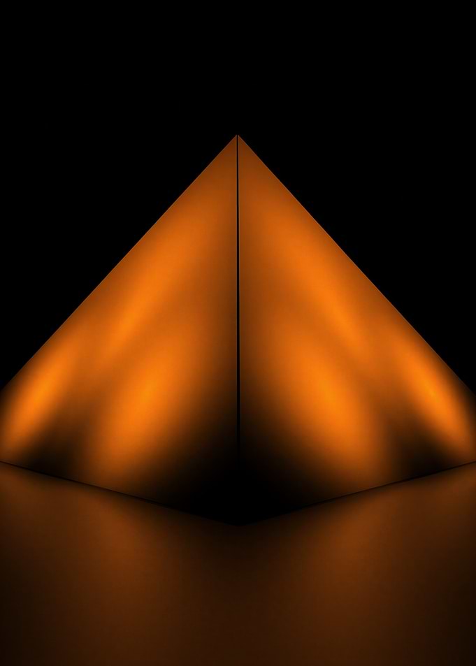 Abstract Orange Pyramid on Black Background