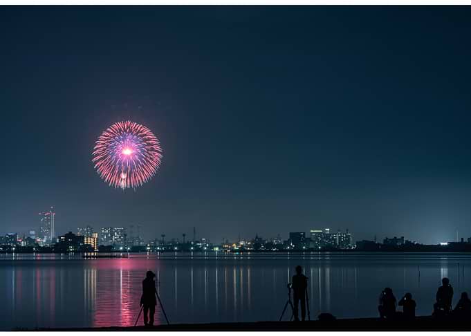 Fireworks over city at night