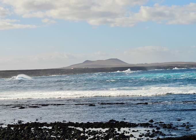 Waves Beneath the Volcanic Horizon – Lanzarote