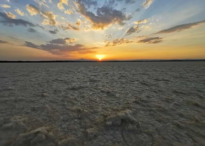 Sunset over a textured landscape