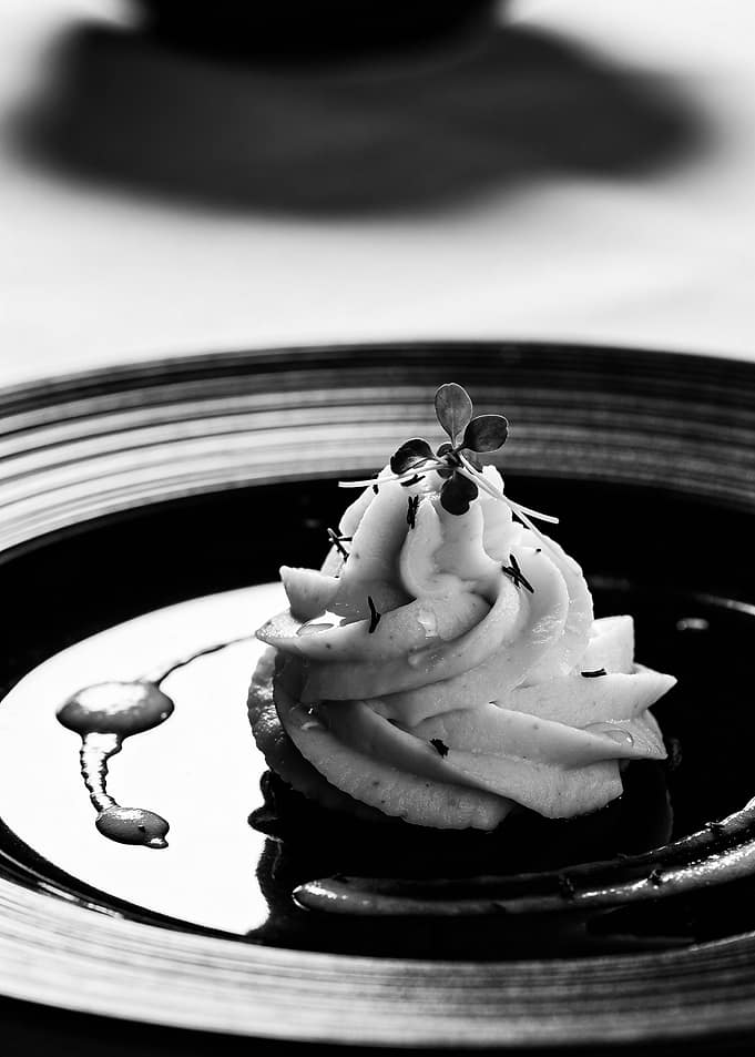 Elegant Dessert on Black Plate