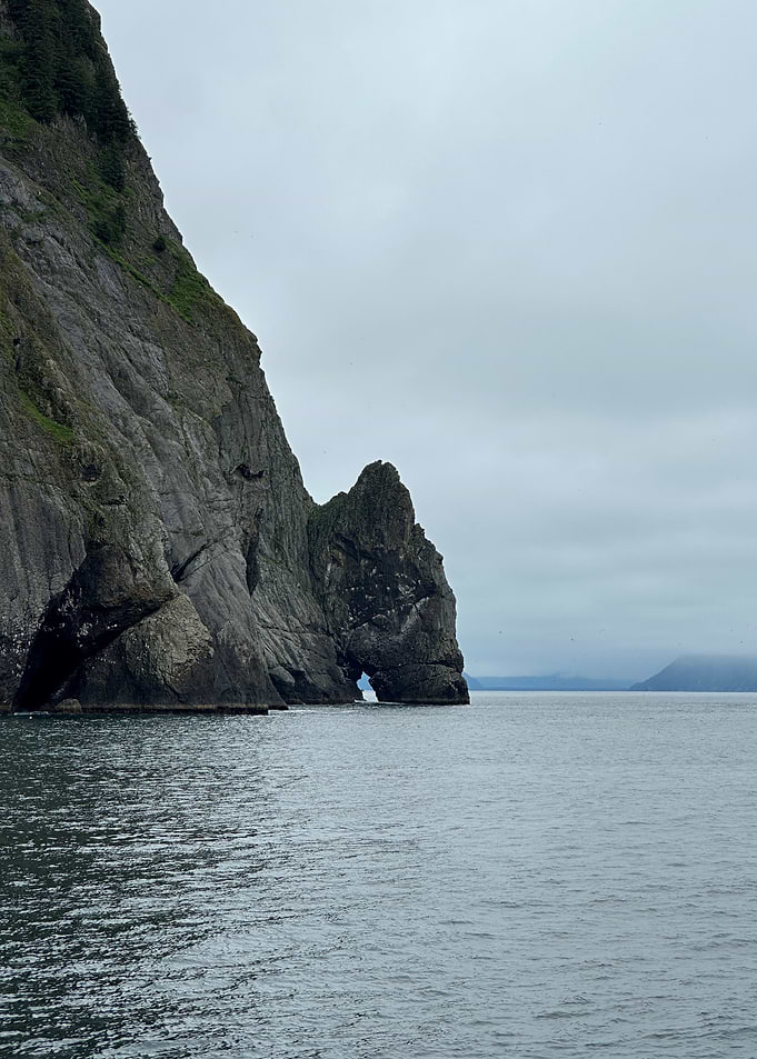 Coastal Rock Formation with Natural Arch
