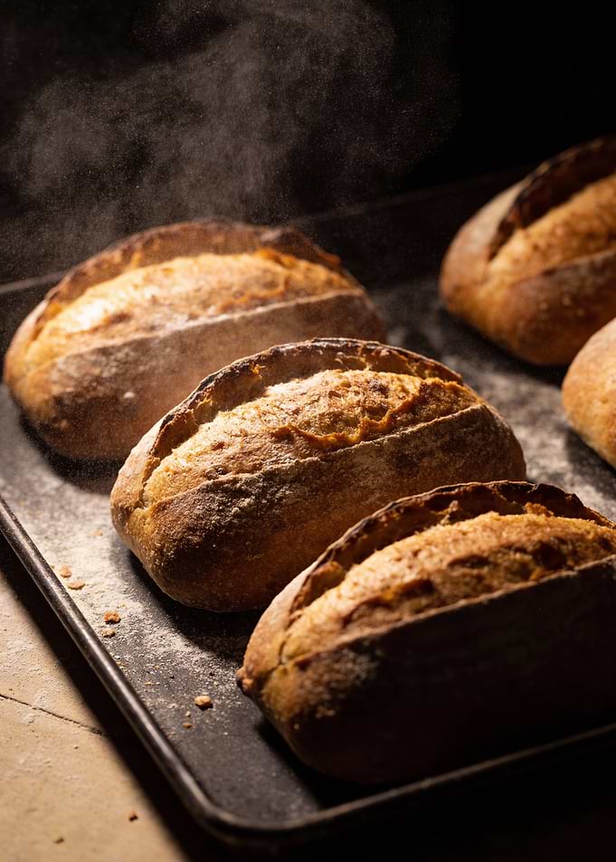 Freshly Baked Bread Loaves on Tray