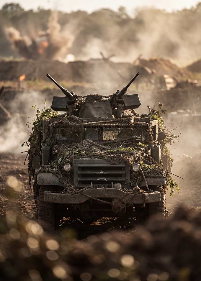 Camouflaged Military Vehicle in Action