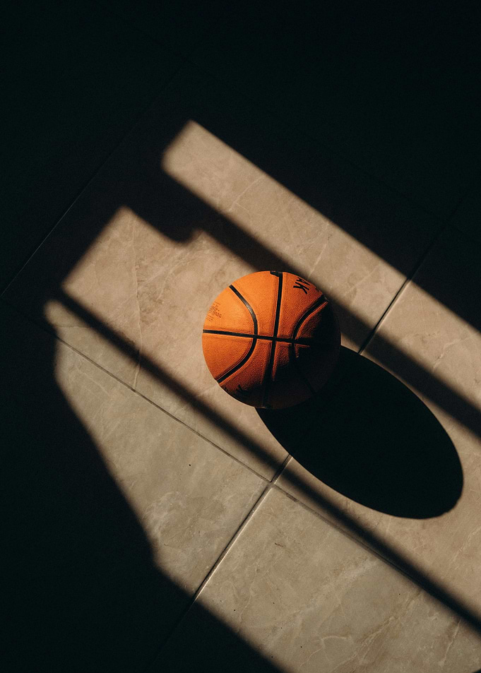 Basketball on Tiled Floor with Shadows