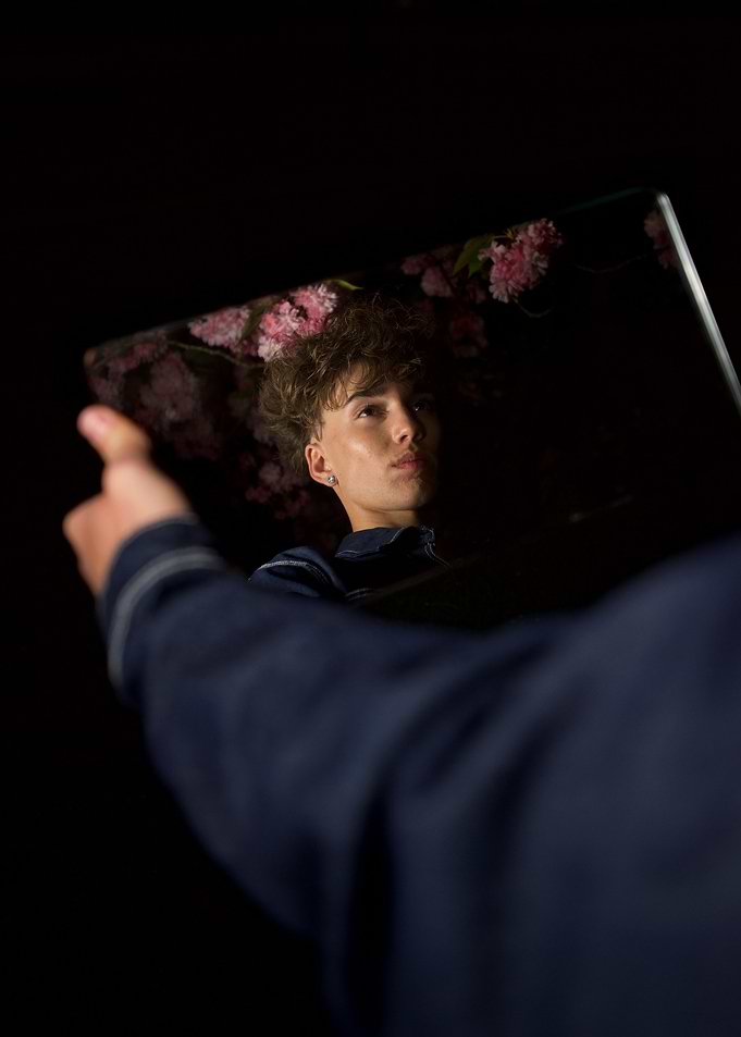 Mirror Reflection with Floral Background