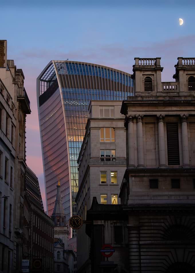 London Cityscape at Dusk with Moon