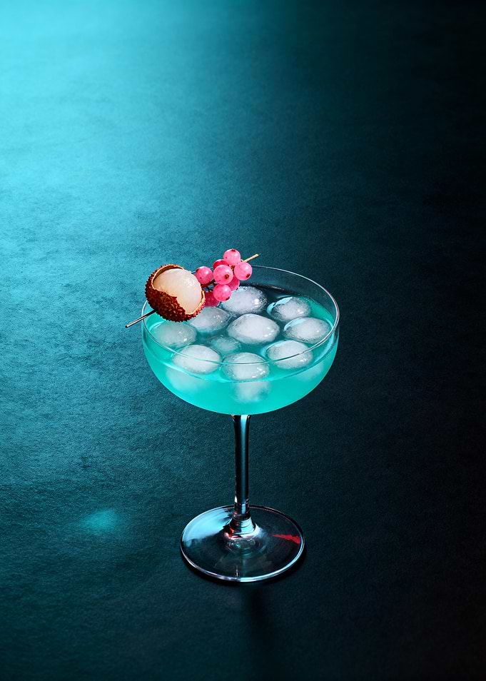 Blue Cocktail with Lychee and Currants