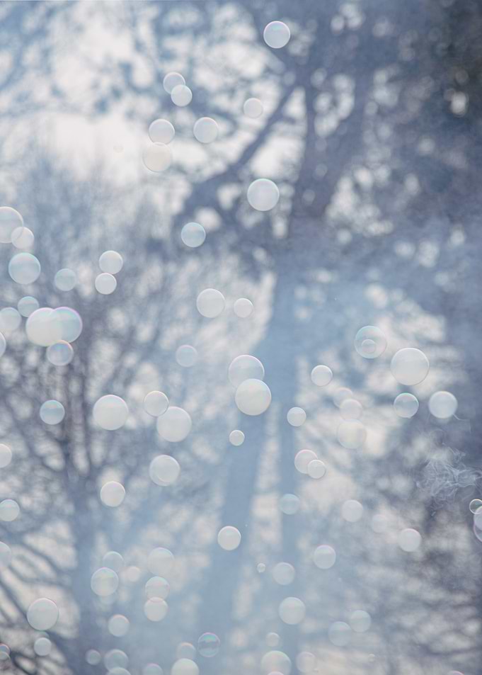 Floating Bubbles in a Winter Scene