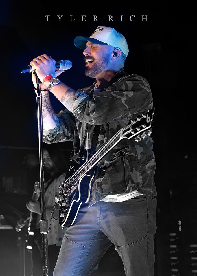Tyler Rich performing on stage