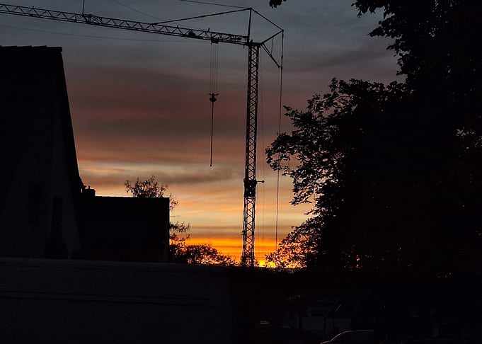 Sunset with Crane Silhouette