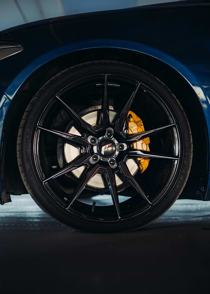 Blue Car Wheel with Black Rim