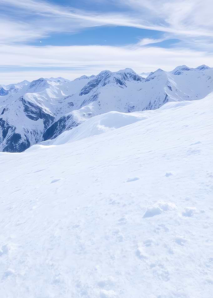 Snowy Mountain Range Under Blue Sky