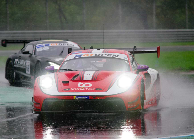 Racing cars in the rain