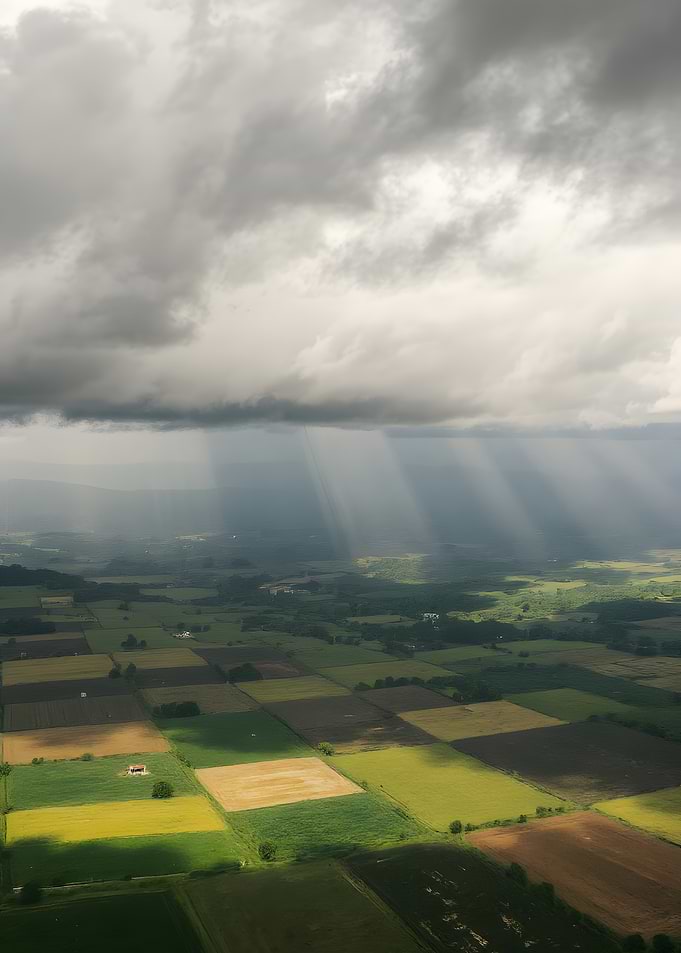 Sun Rays Over Farmland