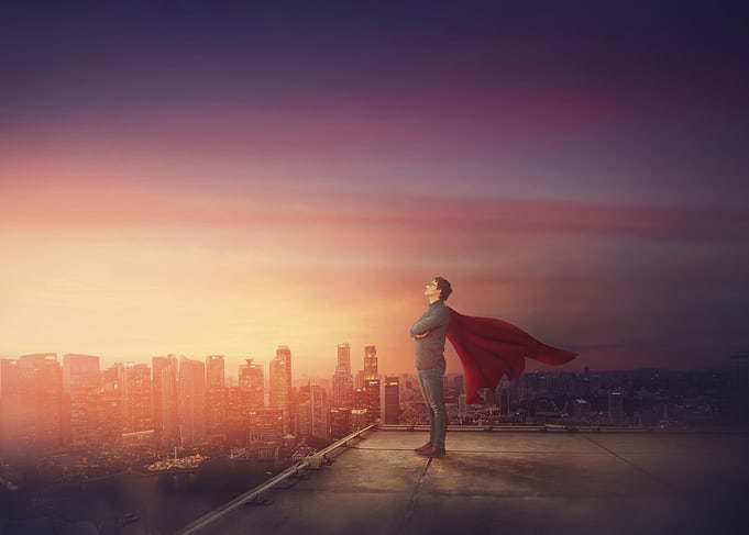 Superhero on Rooftop at Sunset