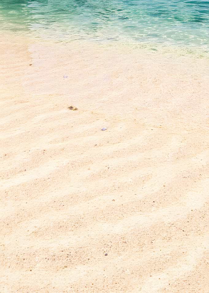 Beach sand and clear water