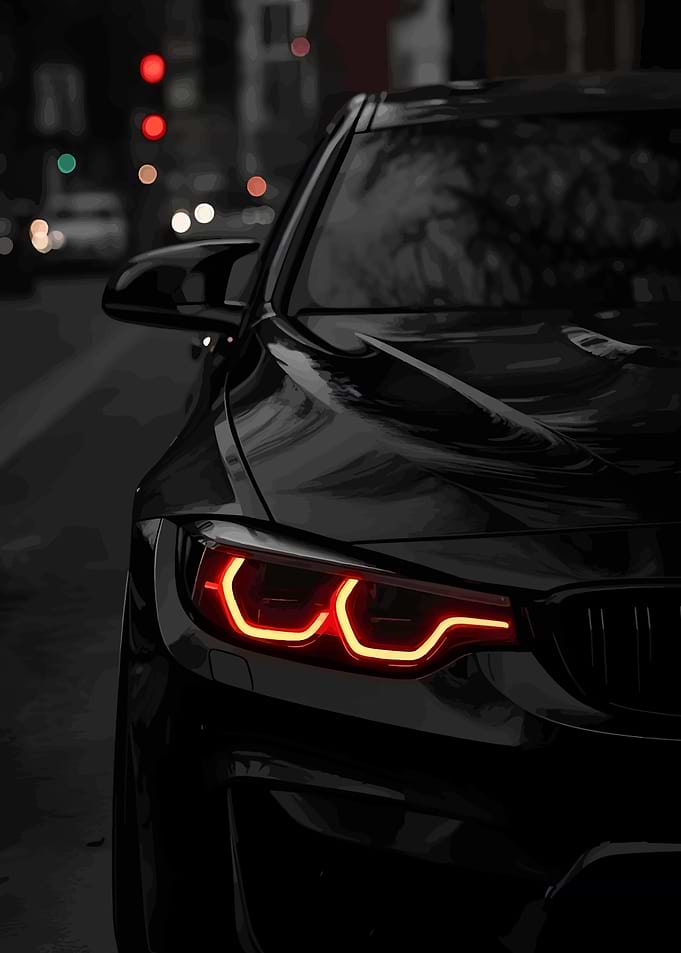 Sleek Black Car with Red Headlights