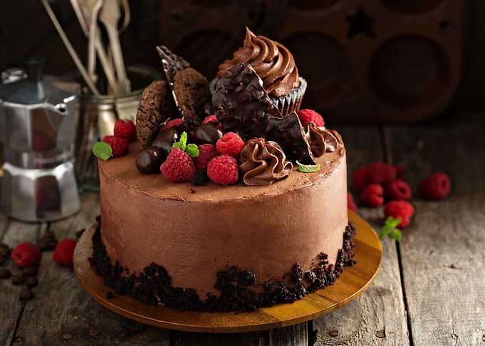 Chocolate Cake with Raspberries and Cupcake