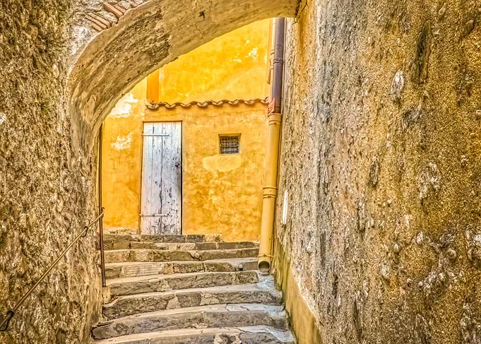 Stone archway over steps in Europe