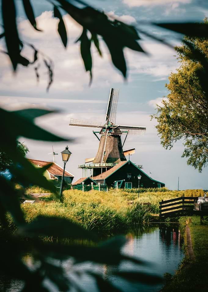 Dutch Windmill Landscape with Water Canal