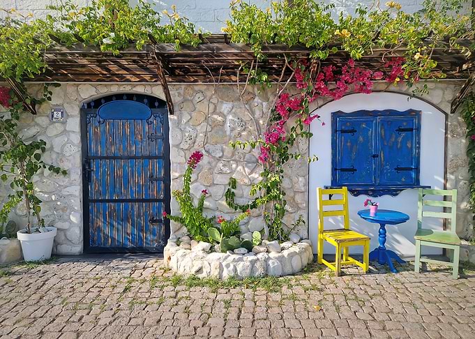 Charming Mediterranean Courtyard with Blue Accents