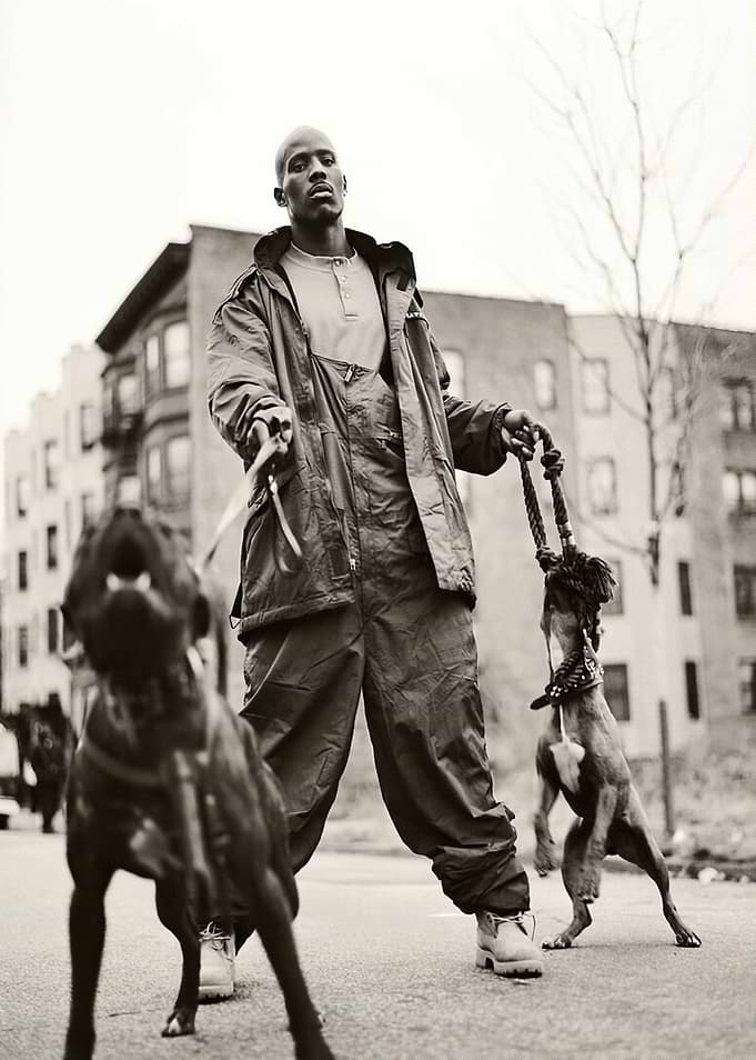 DMX with dogs in black and white