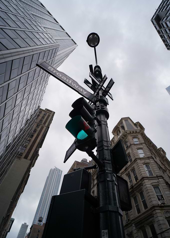 Broadway street sign and traffic light