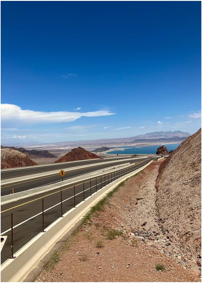 Desert Highway Landscape with Blue Sky