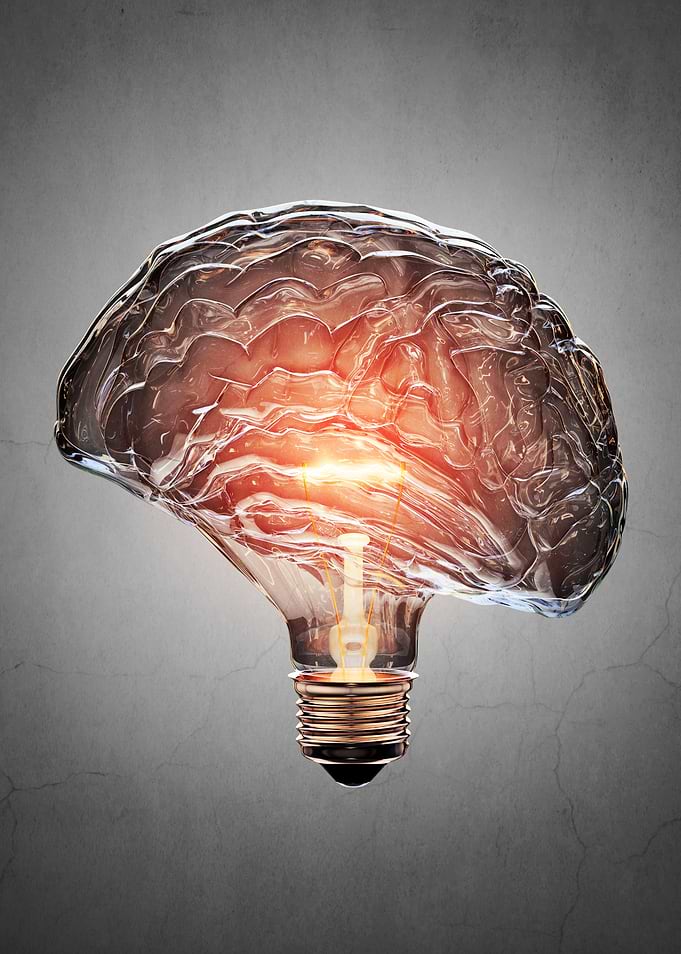Brain-shaped lightbulb idea concept