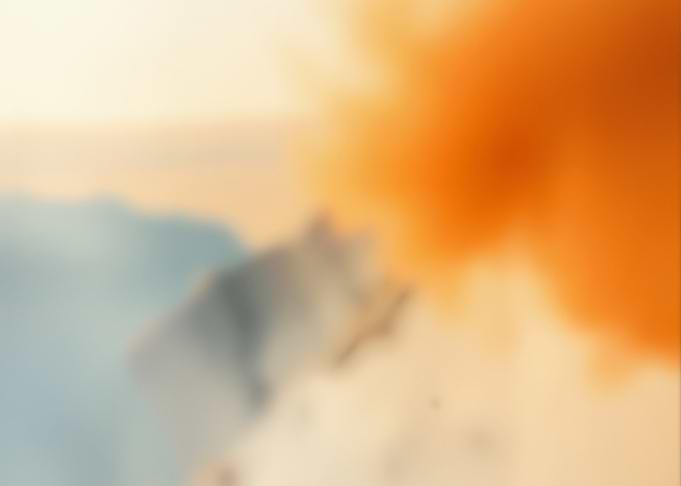 Abstract orange smoke over mountains