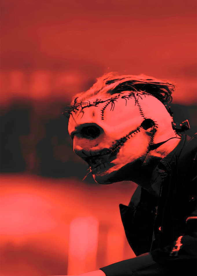 Masked Figure in Red Light