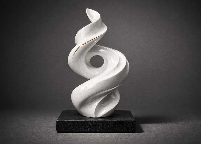 Abstract White Sculpture on Black Base