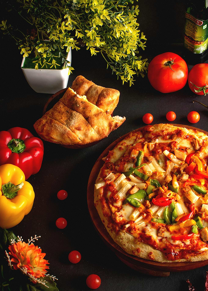 Delicious Pizza and Bread Still Life