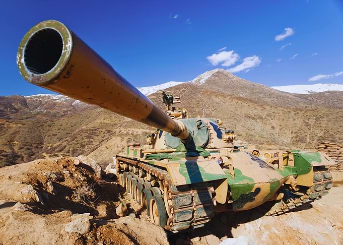 Tank in a Mountainous Landscape