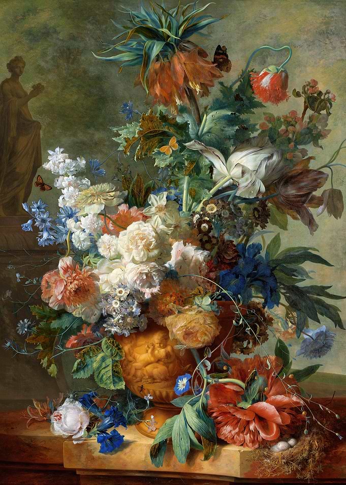Opulent Floral Arrangement with Statue
