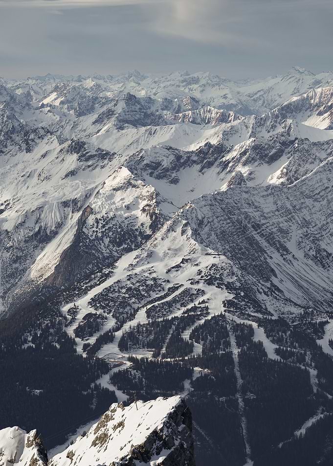 Snowy Mountain Range with Ski Slopes