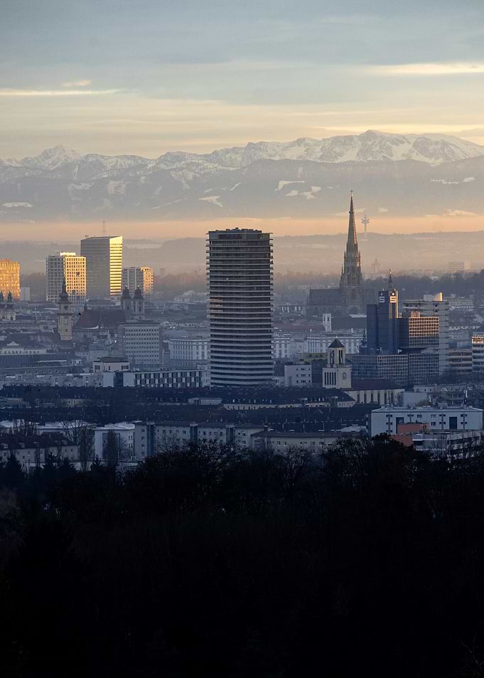 Cityscape with Mountains at Sunset