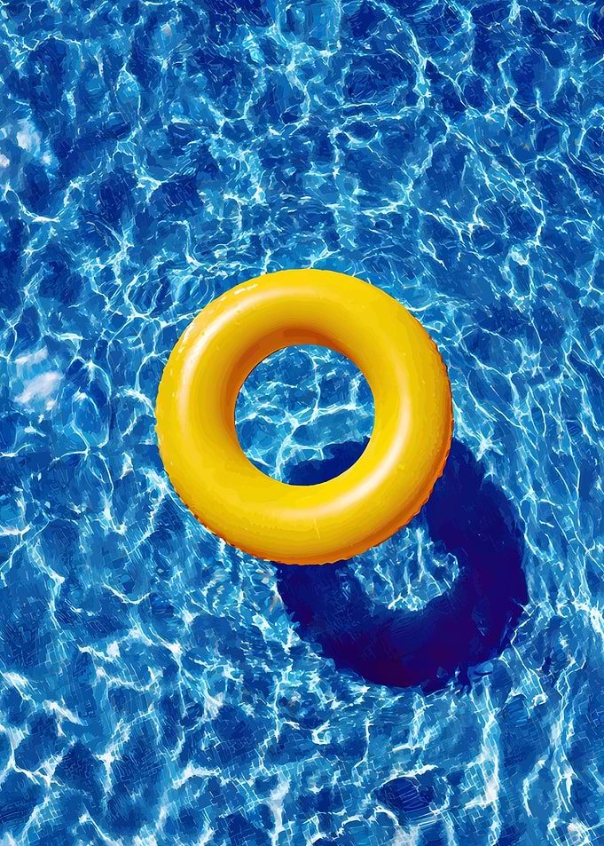 Yellow inflatable ring floating in pool